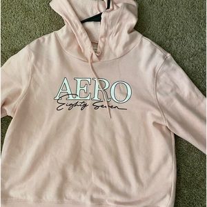 Flowy cropped light pink hoodie from aeropostal